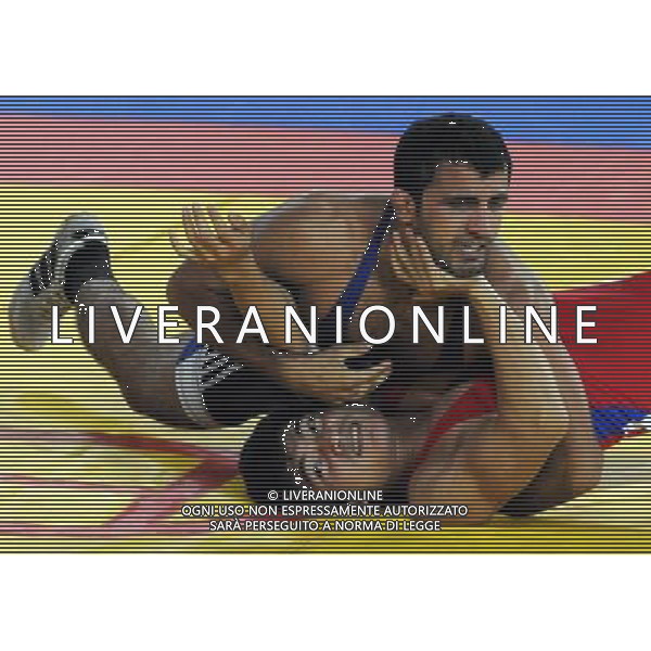 (101121) -- GUANGZHOU, Nov. 21, 2010 () -- Sunikumar Rana(Top) of India fights against Sutep Oomchompoo of Thailand during the bronze medal match of Men¡¯s Greco-Roman 66kg Final of Wrestling at the 16th Asian Games in Guangzhou, south China\'s Guangdong Province, Nov. 21, 2010. Sunikumar Rana won the match and took the bronze. (/Li Yong)(wll) ©photoshot/Agenzia Aldo Liverani Sas - ITALY ONLY - CINA: 16mi Giochi Asiatici