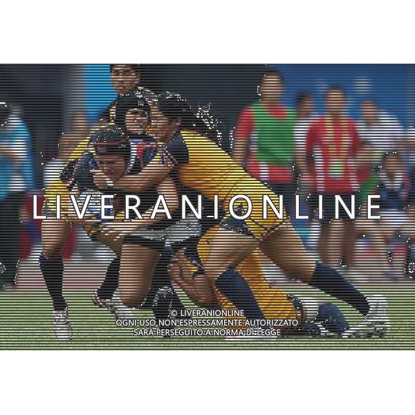 (101121) -- GUANGZHOU, Nov. 21, 2010 () -- Samantha Scott (front L) of Hong Kong of China competes during the women\'s preliminary round of rugby competition against Thailand at the 16th Asian Games in Guangzhou, south China\'s Guangdong Province, Nov. 21, 2010. Hong Kong of China lost the match 14-17. (/Chen Kai) ©photoshot/Agenzia Aldo Liverani Sas - ITALY ONLY - CINA: 16mi Giochi Asiatici