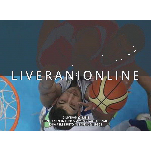 (101121) -- GUANGZHOU, Nov. 21, 2010 () -- Players fight for the ball during a preliminary match between Jordan and Uzbekistan of Men\'s Basketball event at the 16th Asian Games in Guangzhou, south China\'s Guangdong Province, Nov. 21, 2010. Jordan won the match in extra time with 68-63. (/Meng Yongmin) ©photoshot/Agenzia Aldo Liverani Sas - ITALY ONLY - CINA: 16mi Giochi Asiatici
