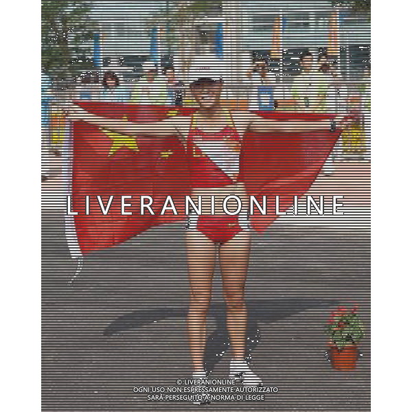 (101123) -- GUANGZHOU, Nov. 23, 2010 (Xinhua) -- China\'s Liu Hong jubilates after the women\'s 20km race walking at the 16th Asian Games in Guangzhou, south China\'s Guangdong Province, Nov. 23, 2010. Liu won the title with 1 hour 30 minutes and 6 seconds. (Xinhua/Liao Yujie) ©photoshot/Agenzia Aldo Liverani Sas - ITALY ONLY - CINA: 16mi Giochi Asiatici