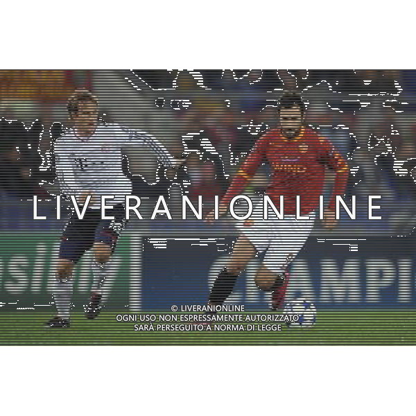 Roma - 23/11/2010 - Stadio Olimpico - Uefa Champions League 2010-2011 - Fase a gironi - Gruppo E - Roma vs Bayern - nella foto: mirko vucinic e Ottl © Fabrizio Corradetti - ag.Aldo Liverani sas
