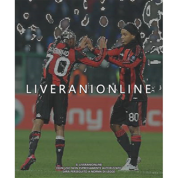 UEFA Champions League 2010/2011 Gruppo G Auxerre (Francia) - 23.11.2010 Auxerre-Milan Nella Foto:ronaldinho esulta con robinho /Ph.Vitez-Ag. Aldo Liverani