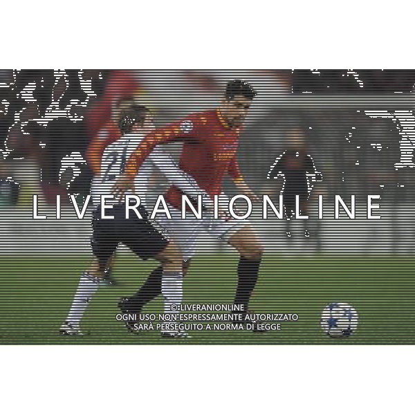 Roma - 23/11/2010 - Stadio Olimpico - Uefa Champions League 2010-2011 - Fase a gironi - Gruppo E - Roma vs Bayern - nella foto: Marco Borriello e Philipp Lahm © Fabrizio Corradetti - ag.Aldo Liverani sas