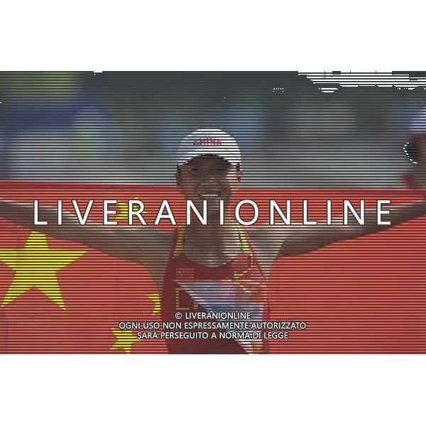 (101123) -- GUANGZHOU, Nov. 23, 2010 (Xinhua) -- China\'s Liu Hong jubilates after the women\'s 20km race walking at the 16th Asian Games in Guangzhou, south China\'s Guangdong Province, Nov. 23, 2010. Liu won the title with 1 hour 30 minutes and 6 seconds. (Xinhua/Li Gang) ©PHOTOSHOT/Agenzia Aldo Liverani Sas - ITALY ONLY: CINA - 16mi GIOCHI OLIMPICI ASIATICI