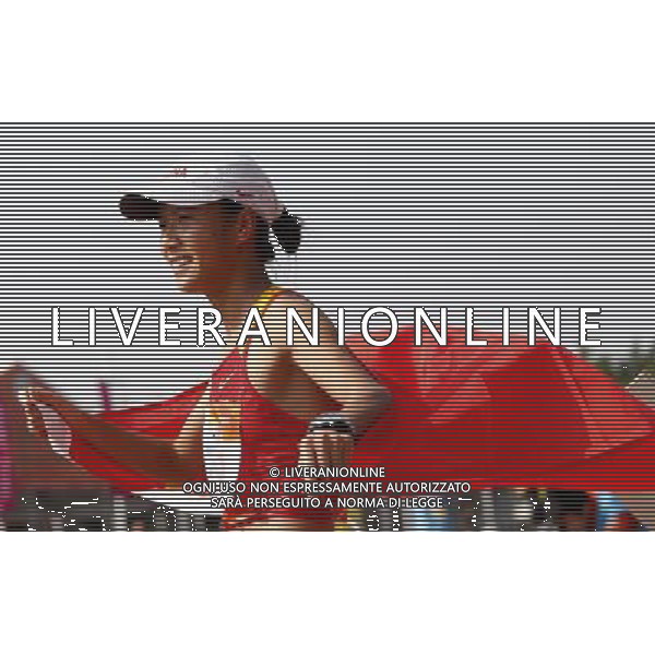 (101123) -- GUANGZHOU, Nov. 23, 2010 (Xinhua) -- China\'s Liu Hong jubilates after the women\'s 20km race walking at the 16th Asian Games in Guangzhou, south China\'s Guangdong Province, Nov. 23, 2010. Liu won the title with 1 hour 30 minutes and 6 seconds. (Xinhua/Wang Lili) ©PHOTOSHOT/Agenzia Aldo Liverani Sas - ITALY ONLY: CINA - 16mi GIOCHI OLIMPICI ASIATICI