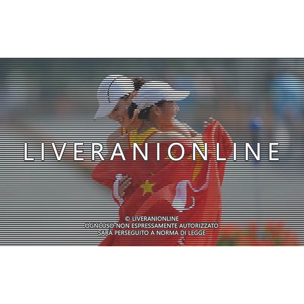 (101123) -- GUANGZHOU, Nov. 23, 2010 (Xinhua) -- China\'s Liu Hong (R) jubilates with her compatriot Li Yanfei the women\'s 20km race walking at the 16th Asian Games in Guangzhou, south China\'s Guangdong Province, Nov. 23, 2010. Liu won the title with 1 hour 30 minutes and 6 seconds. Li Yanfei got the bronze medal. (Xinhua/Li Gang) ©PHOTOSHOT/Agenzia Aldo Liverani Sas - ITALY ONLY: CINA - 16mi GIOCHI OLIMPICI ASIATICI