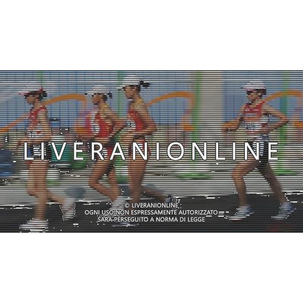 (101123) -- GUANGZHOU, Nov. 23, 2010 (Xinhua) -- Japan\'s Mayumi Kawasaki (L1), China\'s Liu Hong (L2), Li Yanfei (R2) and Japan\'s Masumi Fuchise compete during the women\'s 20km race walking at the 16th Asian Games in Guangzhou, south China\'s Guangdong Province, Nov. 23, 2010. China\'s Liu Hong won the title with 1 hour 30 minutes and 6 seconds. (Xinhua/Lui Sui Wai) ©PHOTOSHOT/Agenzia Aldo Liverani Sas - ITALY ONLY: CINA - 16mi GIOCHI OLIMPICI ASIATICI