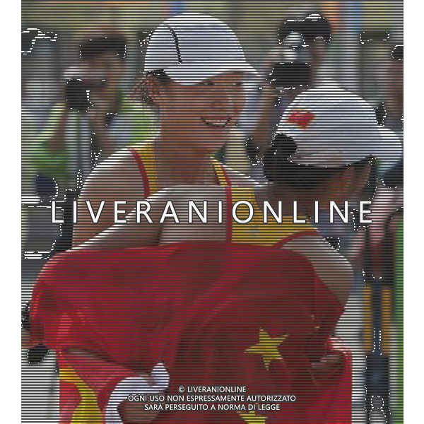 (101123) -- GUANGZHOU, Nov. 23, 2010 () -- China\'s Liu Hong jubilates with her compatriot Li Yanfei (L) after the women\'s 20km race walking at the 16th Asian Games in Guangzhou, south China\'s Guangdong Province, Nov. 23, 2010. (/Wang Lili) ©PHOTOSHOT/Agenzia Aldo Liverani Sas - ITALY ONLY: CINA - 16mi GIOCHI OLIMPICI ASIATICI
