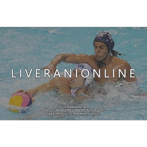 (101123) -- GUANGZHOU, Nov. 23, 2010 () -- China\'s Liang Zhongxing (L) fights with Saudi Arabia\'s Bader Nasser M Al Dughather during the men\'s quarterfinal of waterpolo at the 16th Asian Games in Guangzhou, south China\'s Guangdong Province, Nov. 23, 2010. China won by 22-2. (/Lui Siu Wai) ©PHOTOSHOT/Agenzia Aldo Liverani Sas - ITALY ONLY: CINA - 16mi GIOCHI OLIMPICI ASIATICI