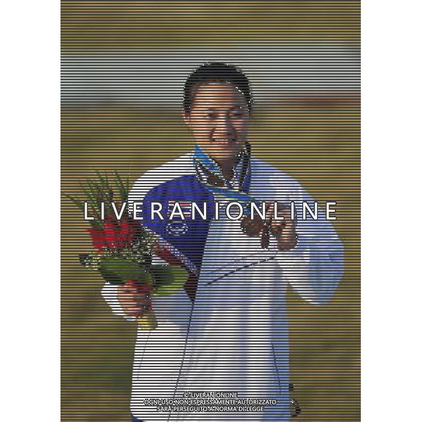 (101123) -- GUANGZHOU, Nov. 23, 2010 () -- Bronze medalist Sutiya Jiewchaloemmit of Thailand poses on the podium during the awarding ceremony for the women\'s Skeet of shooting event at the 16th Asian Games in Guangzhou, south China\'s Guangdong Province, Nov. 23, 2010. (/Chen Yehua) ©PHOTOSHOT/Agenzia Aldo Liverani Sas - ITALY ONLY: CINA - 16mi GIOCHI OLIMPICI ASIATICI