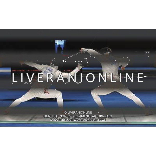 (101123) -- GUANGZHOU, Nov. 23, 2010 () -- Zhu Jun (R) of China competes during the men\'s team foil semifinal against Hong Kong of China at the 16th Asian Games in Guangzhou, south China\'s Guangdong Province, Nov. 23, 2010. China won the match by 45-21 and entered the final. (/Li Yong) ©PHOTOSHOT/Agenzia Aldo Liverani Sas - ITALY ONLY: CINA - 16mi GIOCHI OLIMPICI ASIATICI