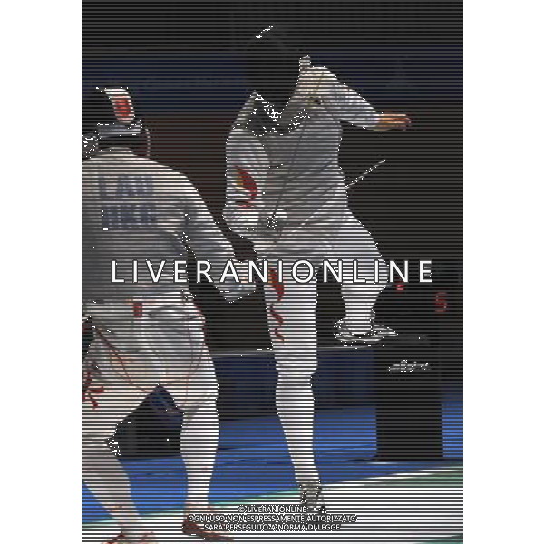 (101123) -- GUANGZHOU, Nov. 23, 2010 () -- Huang Liangcai (R) of China competes during the men\'s team foil semifinal against Hong Kong of China at the 16th Asian Games in Guangzhou, south China\'s Guangdong Province, Nov. 23, 2010. China won the match by 45-21 and entered the final. (/Li Yong) ©PHOTOSHOT/Agenzia Aldo Liverani Sas - ITALY ONLY: CINA - 16mi GIOCHI OLIMPICI ASIATICI