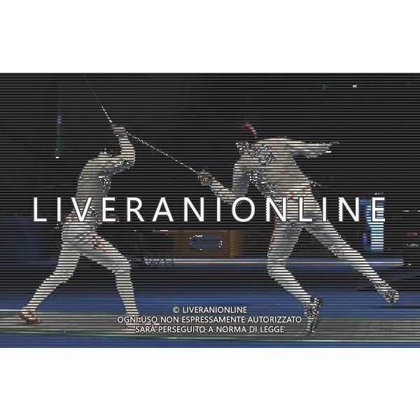 (101123) -- GUANGZHOU, Nov. 23, 2010 () -- Lei Sheng (R) of China competes during the men\'s team foil semifinal against Hong Kong of China at the 16th Asian Games in Guangzhou, south China\'s Guangdong Province, Nov. 23, 2010. China won the match by 45-21 and entered the final. (/Li Yong) ©PHOTOSHOT/Agenzia Aldo Liverani Sas - ITALY ONLY: CINA - 16mi GIOCHI OLIMPICI ASIATICI