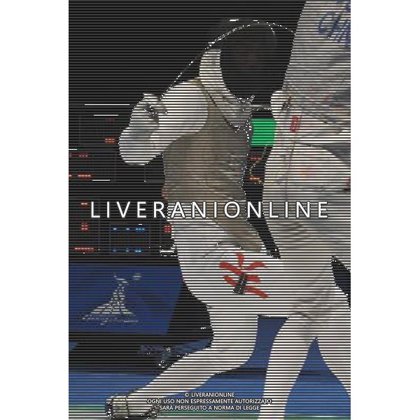 (101123) -- GUANGZHOU, Nov. 23, 2010 () -- Ngan Kyk (L) of Hong Kong of China competes during the men\'s team foil semifinal against China at the 16th Asian Games in Guangzhou, south China\'s Guangdong Province, Nov. 23, 2010. Hong Kong of China lost the match by 21-45 and got the bronze medal. (/Li Yong) ©PHOTOSHOT/Agenzia Aldo Liverani Sas - ITALY ONLY: CINA - 16mi GIOCHI OLIMPICI ASIATICI