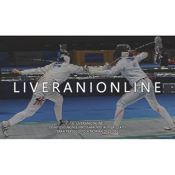 (101123) -- GUANGZHOU, Nov. 23, 2010 () -- Shimookawa Ayaka (R) of Japan competes during the women\'s team epee semifinal against Hong Kong of China at the 16th Asian Games in Guangzhou, south China\'s Guangdong Province, Nov. 23, 2010. Japan won the match by 36-32 and entered the final. (/Li Yong) ©PHOTOSHOT/Agenzia Aldo Liverani Sas - ITALY ONLY: CINA - 16mi GIOCHI OLIMPICI ASIATICI