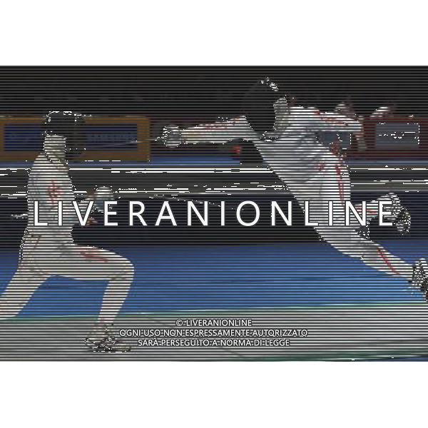 (101123) -- GUANGZHOU, Nov. 23, 2010 () -- Ikeda Megumi (R) of Japan fights against a fencer of Hong Kong of China during the women\'s team epee semifinal at the 16th Asian Games in Guangzhou, south China\'s Guangdong Province, Nov. 23, 2010. Japan won the match by 36-32 and entered the final. (/Li Yong) ©PHOTOSHOT/Agenzia Aldo Liverani Sas - ITALY ONLY: CINA - 16mi GIOCHI OLIMPICI ASIATICI