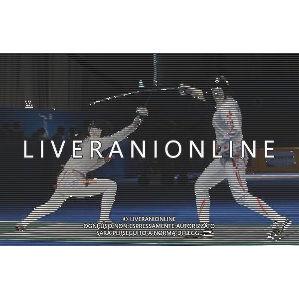 (101123) -- GUANGZHOU, Nov. 23, 2010 () -- Cheng Yuk Han (L) of Hong Kong of China competes with a fencer of Japan during the women\'s team epee semifinal at the 16th Asian Games in Guangzhou, south China\'s Guangdong Province, Nov. 23, 2010. Japan won the match by 36-32 and entered the final. (/Li Yong) ©PHOTOSHOT/Agenzia Aldo Liverani Sas - ITALY ONLY: CINA - 16mi GIOCHI OLIMPICI ASIATICI