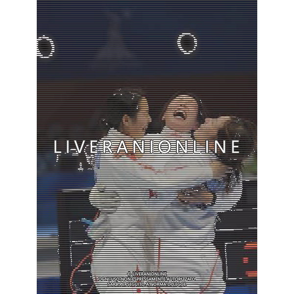 (101123) -- GUANGZHOU, Nov. 23, 2010 () -- Fences of Team Japan celebrate the victory after the women\'s team epee semifinal against Hong Kong of China at the 16th Asian Games in Guangzhou, south China\'s Guangdong Province, Nov. 23, 2010. Japan won the match by 36-32 and entered the final. (/Li Yong) ©PHOTOSHOT/Agenzia Aldo Liverani Sas - ITALY ONLY: CINA - 16mi GIOCHI OLIMPICI ASIATICI