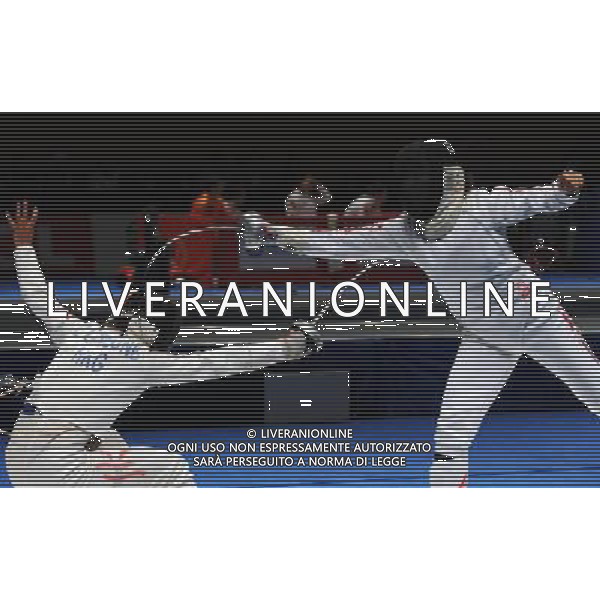 (101123) -- GUANGZHOU, Nov. 23, 2010 () -- Ikeda Megumi (R) of Japan competes with a fencer of Hong Kong of China during the women\'s team epee semifinal at the 16th Asian Games in Guangzhou, south China\'s Guangdong Province, Nov. 23, 2010. Japan won the match by 36-32 and entered the final. (/Li Yong) ©PHOTOSHOT/Agenzia Aldo Liverani Sas - ITALY ONLY: CINA - 16mi GIOCHI OLIMPICI ASIATICI