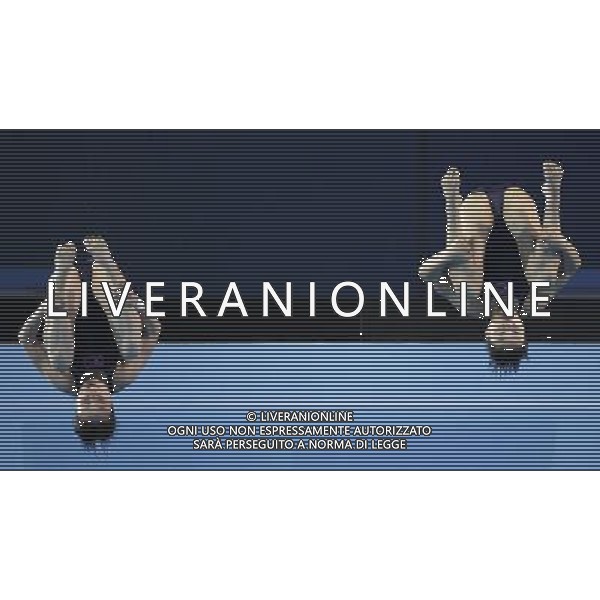 (101123) -- GUANGZHOU, Nov. 23, 2010 () -- Bronze medalists Choe Kum Hui and Kim Un Hyang of the Democratic People\'s Republic of Korea (DPRK) compete during the women\'s Synchronised 10m platform of diving event at the 16th Asian Games in Guangzhou, south China\'s Guangdong Province, Nov. 23, 2010. (/Fei Maohua) ©PHOTOSHOT/Agenzia Aldo Liverani Sas - ITALY ONLY: CINA - 16mi GIOCHI OLIMPICI ASIATICI