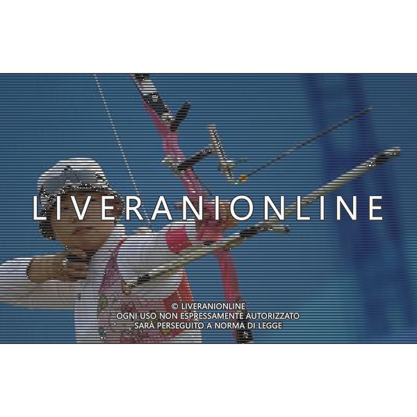 (101123) -- GUANGZHOU, Nov. 23, 2010 () -- South Korea\'s archer Yun Ok Hee competes during the women\'s individual event final of archery at the 16th Asian Games in Guangzhou, south China\'s Guangdong Province, Nov. 23, 2010. Yun Ok Hee beat China\'s Cheng Ming by 6-0 and won the title. (/Gesang Dawa)(sss) ©PHOTOSHOT/Agenzia Aldo Liverani Sas - ITALY ONLY: CINA - 16mi GIOCHI OLIMPICI ASIATICI