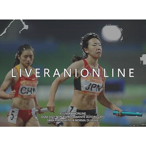 (101123) -- GUANGZHOU, Nov. 23, 2010 () -- Japan\'s Asuka Terada (R) competes during the women\'s 4X100m relay round 1 of athletics at the 16th Asian Games in Guangzhou, south China\'s Guangdong Province, Nov. 23, 2010. Japan entered the final of the event with 44.73 seconds. (/Guo Dayue) ©PHOTOSHOT/Agenzia Aldo Liverani Sas - ITALY ONLY: CINA - 16mi GIOCHI OLIMPICI ASIATICI