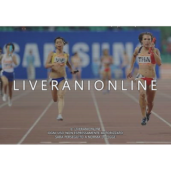 (101123) -- GUANGZHOU, Nov. 23, 2010 () -- Thailand\'s Nongnuch Sanrat (R) competes during the women\'s 4X100m relay round 1 of athletics at the 16th Asian Games in Guangzhou, south China\'s Guangdong Province, Nov. 23, 2010. Thailand entered the final of the event. (/Guo Dayue) ©PHOTOSHOT/Agenzia Aldo Liverani Sas - ITALY ONLY: CINA - 16mi GIOCHI OLIMPICI ASIATICI