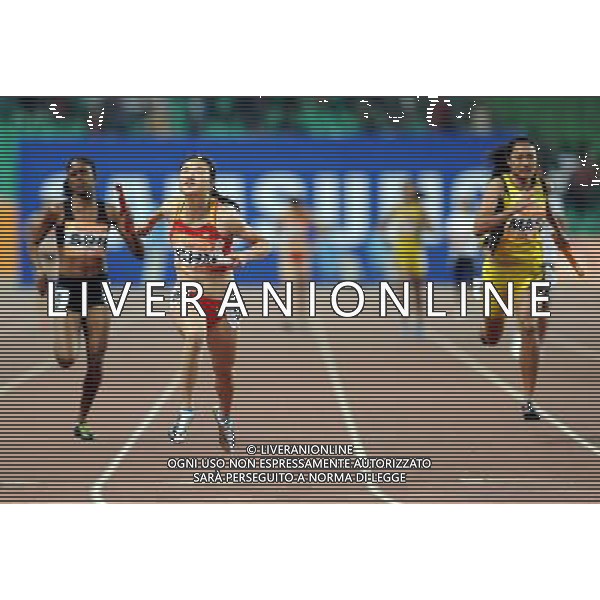 (101123) -- GUANGZHOU, Nov. 23, 2010 () -- China\'s Ye Jiabei (L2) competes during the women\'s 4X100m relay round 1 of athletics at the 16th Asian Games in Guangzhou, south China\'s Guangdong Province, Nov. 23, 2010. China entered the final of the event. (/Guo Dayue) ©PHOTOSHOT/Agenzia Aldo Liverani Sas - ITALY ONLY: CINA - 16mi GIOCHI OLIMPICI ASIATICI
