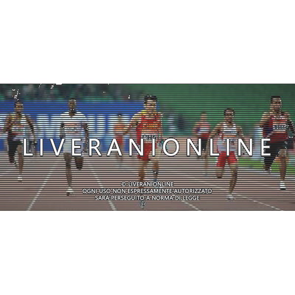 (101123) -- GUANGZHOU, Nov. 23, 2010 () -- China\'s Lao Yi (C)competes during the men\'s 4X100m relay round 1 of athletics at the 16th Asian Games in Guangzhou, south China\'s Guangdong Province, Nov. 23, 2010. China entered the final with 39.03 seconds. (/Guo Dayue) ©PHOTOSHOT/Agenzia Aldo Liverani Sas - ITALY ONLY: CINA - 16mi GIOCHI OLIMPICI ASIATICI