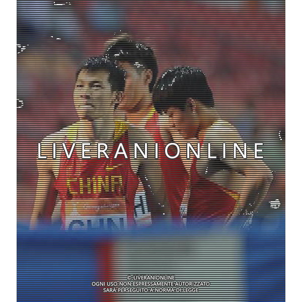 (101123) -- GUANGZHOU, Nov. 23, 2010 () -- China\'s Lao Yi (L) reacts after the men\'s 4X100m relay round 1 of athletics at the 16th Asian Games in Guangzhou, south China\'s Guangdong Province, Nov. 23, 2010. China entered the final with 39.03 seconds. (/Guo Dayue) ©PHOTOSHOT/Agenzia Aldo Liverani Sas - ITALY ONLY: CINA - 16mi GIOCHI OLIMPICI ASIATICI