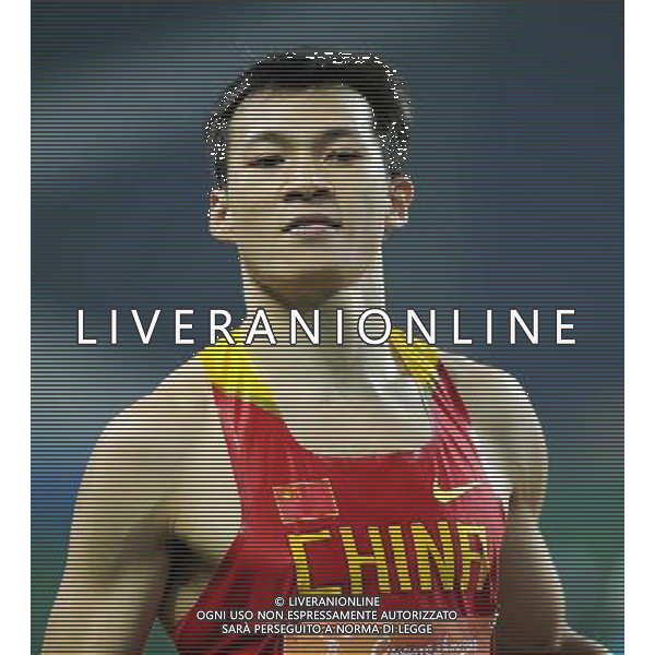 (101123) -- GUANGZHOU, Nov. 23, 2010 () -- China\'s Lao Yi reacts after the men\'s 4X100m relay round 1 of athletics at the 16th Asian Games in Guangzhou, south China\'s Guangdong Province, Nov. 23, 2010. China entered the final with 39.03 seconds. (/Guo Dayue) ©PHOTOSHOT/Agenzia Aldo Liverani Sas - ITALY ONLY: CINA - 16mi GIOCHI OLIMPICI ASIATICI