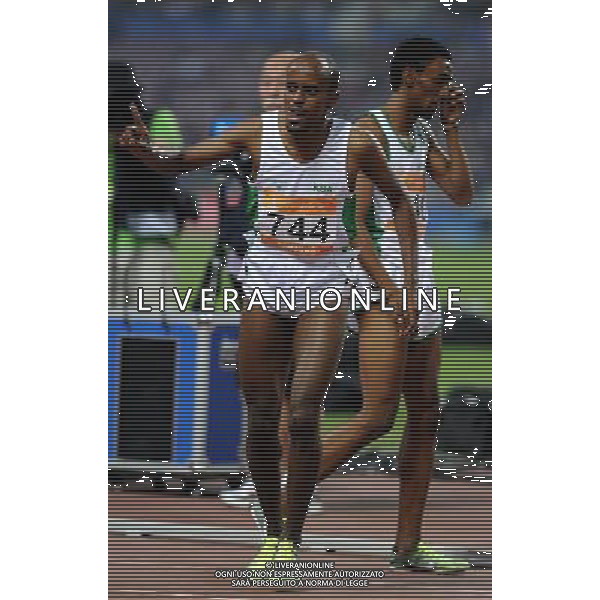 (101123) -- GUANGZHOU, Nov. 23, 2010 () -- Saudi Arabia\'s Mohammed Othman Shaween (L) jubilates after the men\'s 1500m final of athletics at the 16th Asian Games in Guangzhou, south China\'s Guangdong Province, Nov. 23, 2010. Mohammed Othman Shaween claimed the title with 3 minutes and 36.49 seconds. (/Guo Dayue) ©PHOTOSHOT/Agenzia Aldo Liverani Sas - ITALY ONLY: CINA - 16mi GIOCHI OLIMPICI ASIATICI