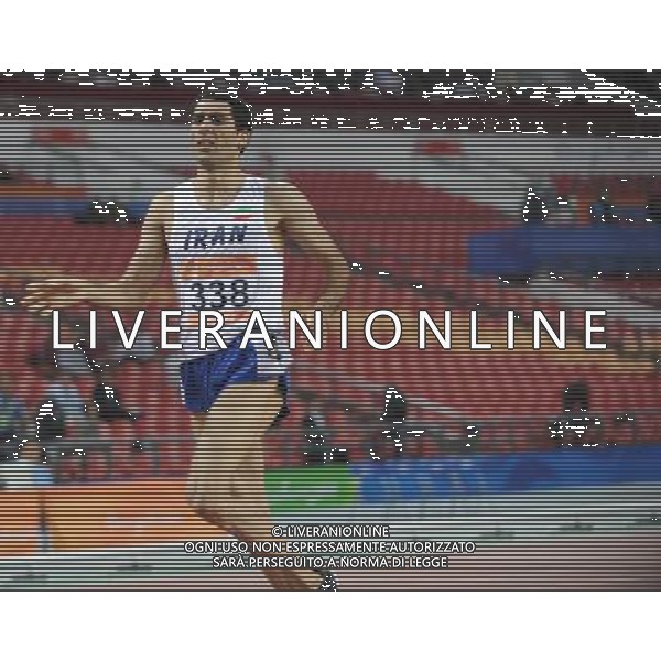 (101123) -- GUANGZHOU, Nov. 23, 2010 () -- Iran\'s Sajad Moradi runs across the finish line during the men\'s 1500m final of athletics at the 16th Asian Games in Guangzhou, south China\'s Guangdong Province, Nov. 23, 2010. Sajad Moradi took the silver of the event. (/Li Gang) ©PHOTOSHOT/Agenzia Aldo Liverani Sas - ITALY ONLY: CINA - 16mi GIOCHI OLIMPICI ASIATICI