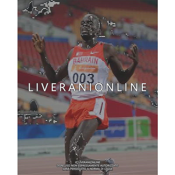 (101123) -- GUANGZHOU, Nov. 23, 2010 () -- Bahrain\'s Belal Mansoor Belal Ali runs across the finish line during the men\'s 1500m final of athletics at the 16th Asian Games in Guangzhou, south China\'s Guangdong Province, Nov. 23, 2010. Belal Mansoor Belal Ali got the bronze medal. (/Li Gang) ©PHOTOSHOT/Agenzia Aldo Liverani Sas - ITALY ONLY: CINA - 16mi GIOCHI OLIMPICI ASIATICI