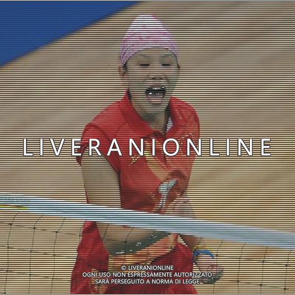 (101124) -- GUANGZHOU, Nov. 24, 2010 (Xinhua) -- China\'s Song Cheng jubilates during the sepaktakraw women\'s regu round robin round 10 against Myanmar at the 16th Asian Games in Guangzhou, south China\'s Guangdong Province, Nov. 24, 2010. China won the match by 2-1. (Xinhua/Guo Yong) ©PHOTOSHOT/Agenzia Aldo Liverani Sas - ITALY ONLY: CINA - 16mi GIOCHI OLIMPICI ASIATICI