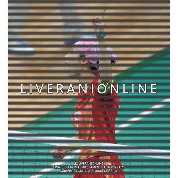 (101124) -- GUANGZHOU, Nov. 24, 2010 (Xinhua) -- China\'s Song Cheng jubilates during the sepaktakraw women\'s regu round robin round 10 against Myanmar at the 16th Asian Games in Guangzhou, south China\'s Guangdong Province, Nov. 24, 2010. China won the match by 2-1. (Xinhua/Guo Yong) ©PHOTOSHOT/Agenzia Aldo Liverani Sas - ITALY ONLY: CINA - 16mi GIOCHI OLIMPICI ASIATICI