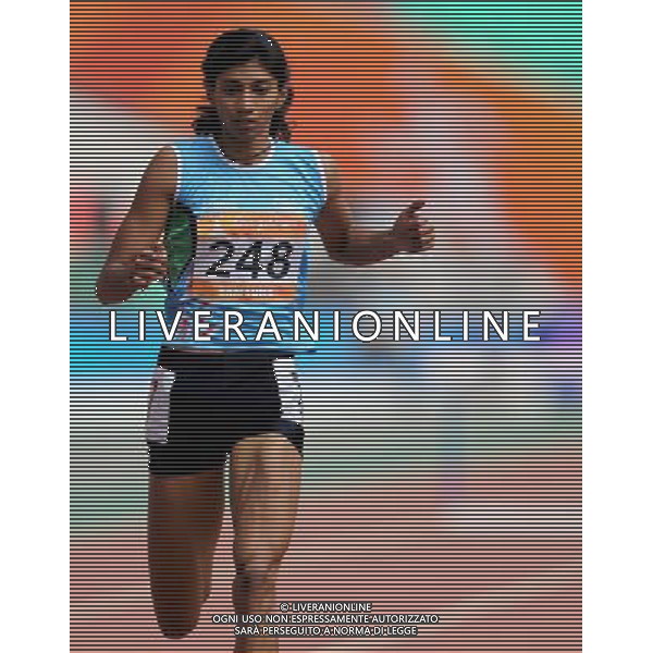 (101124) -- GUANGZHOU, Nov. 24, 2010 (Xinhua) -- India\'s Ashwini Chidananda Akkunji runs across the finish line during the women\'s 400m hurdles round 1 of athletics at the 16th Asian Games in Guangzhou, south China\'s Guangdong Province, Nov. 24, 2010. Ashwini Chidananda Akkunji entered the final. (Xinhua/Li Ming) ©PHOTOSHOT/Agenzia Aldo Liverani Sas - ITALY ONLY: CINA - 16mi GIOCHI OLIMPICI ASIATICI