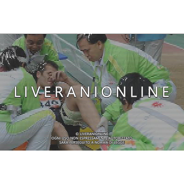 (101124) -- GUANGZHOU, Nov. 24, 2010 (Xinhua) -- Iran\'s Hadi Sepehrzad is carried on a stretcher after injured during the men\'s long jump decathlon of athletics at the 16th Asian Games in Guangzhou, south China\'s Guangdong Province, Nov. 24, 2010. (Xinhua/Li Gang) ©PHOTOSHOT/Agenzia Aldo Liverani Sas - ITALY ONLY: CINA - 16mi GIOCHI OLIMPICI ASIATICI