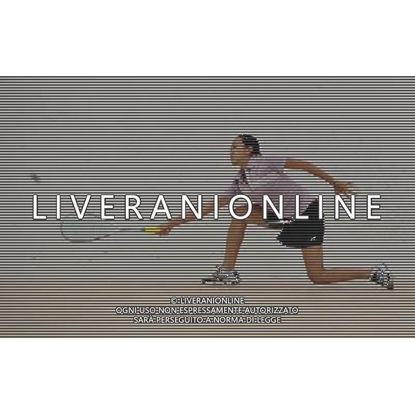 (101124) -- GUANGZHOU, Nov. 24, 2010 (Xinhua) -- Malaysia\'s Low Wee Wern competes against India\'s Anaka Alankomony during women\'s team event semifinal of Squash at the 16th Asian Games in Guangzhou, south China\'s Guangdong Province. Malaysia won the match 2-0. (Xinhua/Jiang Kehong) ©PHOTOSHOT/Agenzia Aldo Liverani Sas - ITALY ONLY: CINA - 16mi GIOCHI OLIMPICI ASIATICI