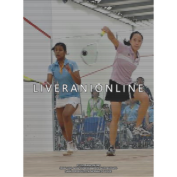 (101124) -- GUANGZHOU, Nov. 24, 2010 (Xinhua) -- Malaysia\'s Low Wee Wern (R) competes against India\'s Anaka Alankomony during women\'s team event semifinal of Squash at the 16th Asian Games in Guangzhou, south China\'s Guangdong Province. Malaysia won the match 2-0. (Xinhua/Jiang Kehong) ©PHOTOSHOT/Agenzia Aldo Liverani Sas - ITALY ONLY: CINA - 16mi GIOCHI OLIMPICI ASIATICI