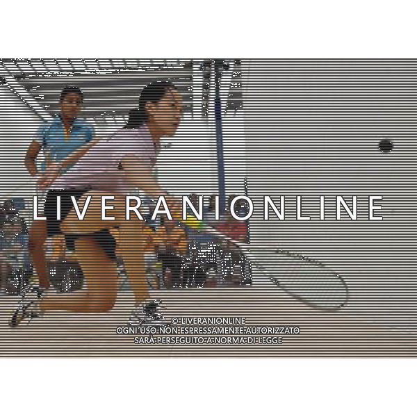 (101124) -- GUANGZHOU, Nov. 24, 2010 (Xinhua) -- Malaysia\'s Low Wee Wern (front) competes against India\'s Anaka Alankomony during women\'s team event semifinal of Squash at the 16th Asian Games in Guangzhou, south China\'s Guangdong Province. Malaysia won the match 2-0. (Xinhua/Jiang Kehong) ©PHOTOSHOT/Agenzia Aldo Liverani Sas - ITALY ONLY: CINA - 16mi GIOCHI OLIMPICI ASIATICI