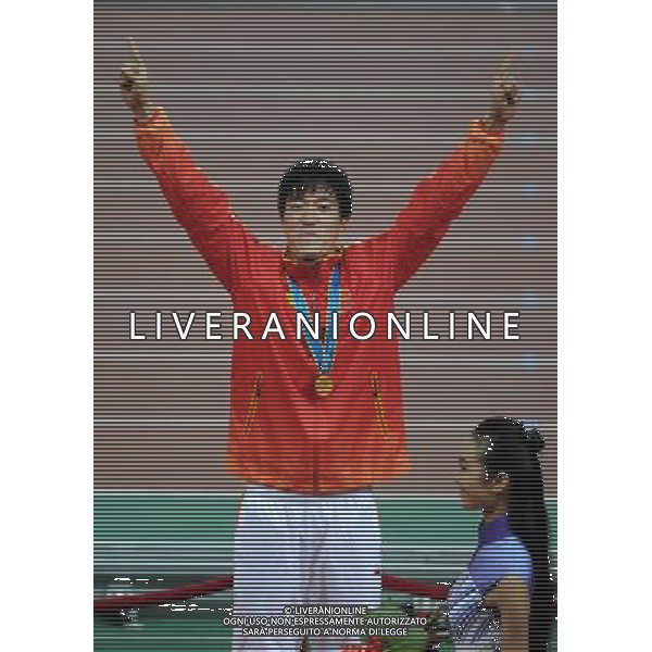 China\'s Liu Xiang celebrates after winning the men\'s 110m hurdles final at the 16th Asian Games in Guangzhou in south China\'s Guangdong province on Wednesday, Nov. 24, 2010. Liu Xiang won gold in 13.09 seconds.(Photo By Kun Ge/ColorChinaPhoto) - AG. ALDO LIVERANI SAS ITALY ONLY CINA - 16mi GIOCHI OLIMPICI ASIATICI 2010