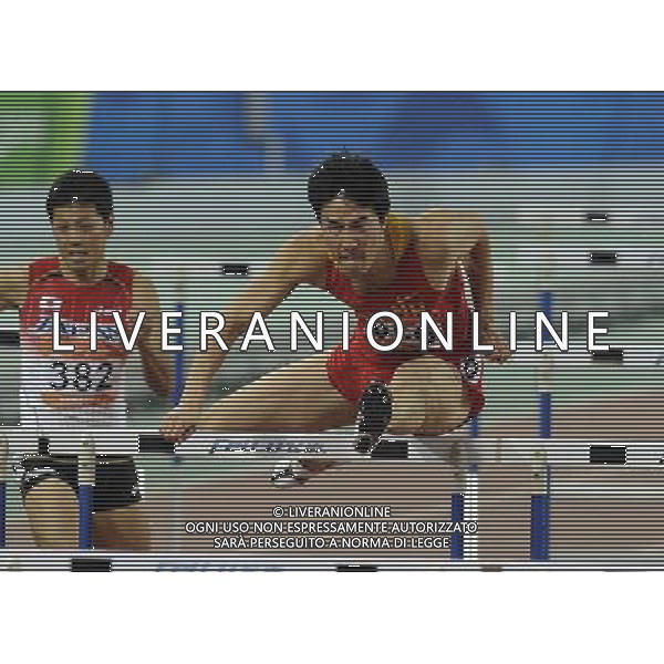 China\'s Liu Xiang competes in the men\'s 110m hurdles final at the 16th Asian Games in Guangzhou in south China\'s Guangdong province on Wednesday, Nov. 24, 2010. Liu Xiang won gold in 13.09 seconds.(Photo By Lu Tong/ColorChinaPhoto) - AG. ALDO LIVERANI SAS ITALY ONLY CINA - 16mi GIOCHI OLIMPICI ASIATICI 2010
