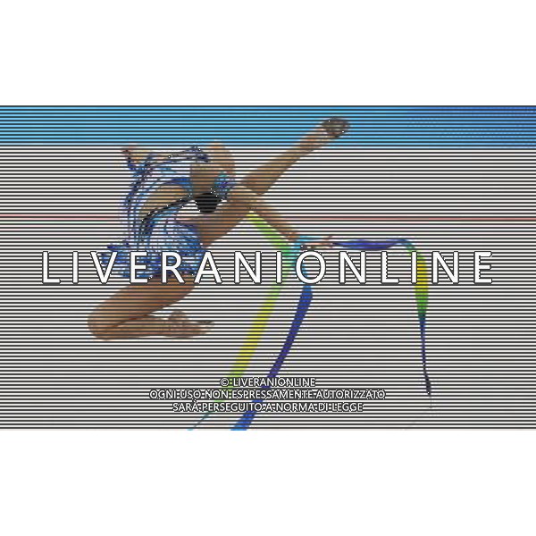 (101126) -- GUANGZHOU, Nov. 26, 2010 () -- Ulyana Trofimova of Uzbekistan performs during the individual all-around event of Rhythmic Gymnastics at the 16th Asian Games in Guangzhou, south China\'s Guangdong Province, Nov. 26, 2010. (/Wang Lei) - Xinhua/Photoshot - Ag. Aldo Liverani sas ITALY ONLY CINA - 16mi GIOCHI ASIATICI 2010: GINNASTICA RITMICA