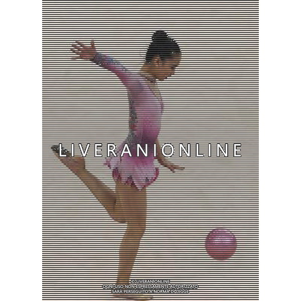(101126) -- GUANGZHOU, Nov. 26, 2010 () -- Son Yeon Jae of South Korea performs during the individual all-around event of Rhythmic Gymnastics at the 16th Asian Games in Guangzhou, south China\'s Guangdong Province, Nov. 26, 2010. (/Wang Lei) - Xinhua/Photoshot - Ag. Aldo Liverani sas ITALY ONLY CINA - 16mi GIOCHI ASIATICI 2010: GINNASTICA RITMICA