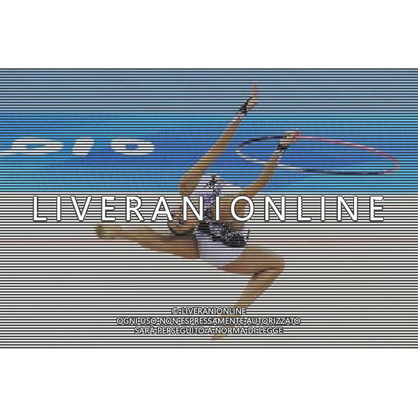 (101126) -- GUANGZHOU, Nov. 26, 2010 () -- Gold medalist Anna Alyabyeva of Kazakhstan performs during the individual all-around event of Rhythmic Gymnastics at the 16th Asian Games in Guangzhou, south China\'s Guangdong Province, Nov. 26, 2010. (/Wang Lei) - Xinhua/Photoshot - Ag. Aldo Liverani sas ITALY ONLY CINA - 16mi GIOCHI ASIATICI 2010: GINNASTICA RITMICA
