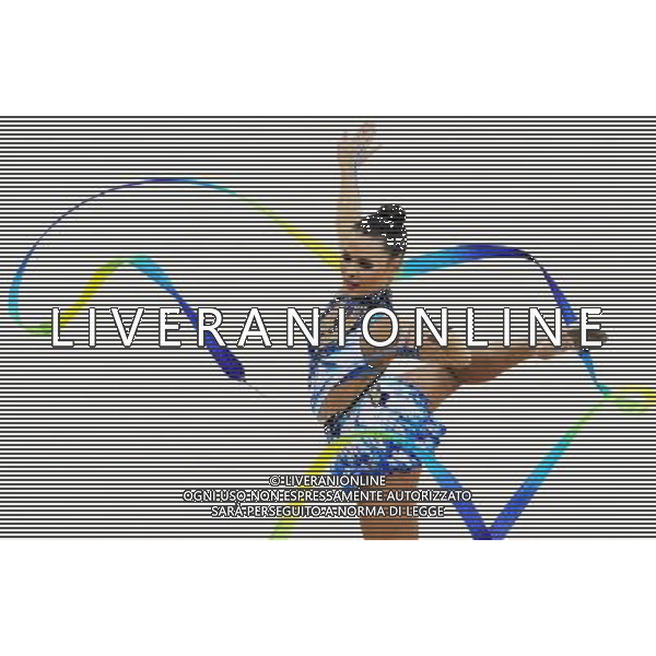 (101126) -- GUANGZHOU, Nov. 26, 2010 () -- Ulyana Trofimova of Uzbekistan performs during the individual all-around event of Rhythmic Gymnastics at the 16th Asian Games in Guangzhou, south China\'s Guangdong Province, Nov. 26, 2010. (/Wang Lei) - Xinhua/Photoshot - Ag. Aldo Liverani sas ITALY ONLY CINA - 16mi GIOCHI ASIATICI 2010: GINNASTICA RITMICA