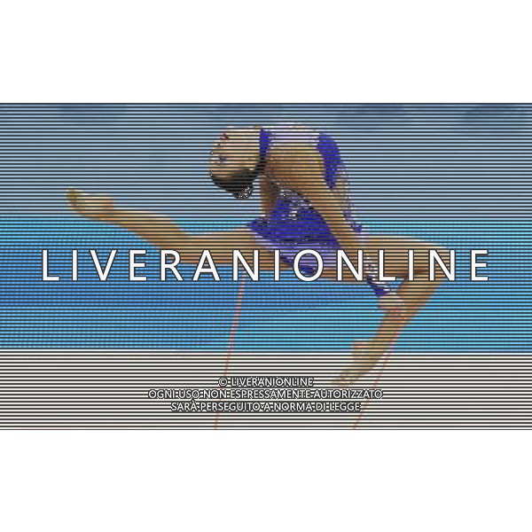 (101126) -- GUANGZHOU, Nov. 26, 2010 () -- Gold medalist Anna Alyabyeva of Kazakhstan performs during the individual all-around event of Rhythmic Gymnastics at the 16th Asian Games in Guangzhou, south China\'s Guangdong Province, Nov. 26, 2010. (/Wang Lei) - Xinhua/Photoshot - Ag. Aldo Liverani sas ITALY ONLY CINA - 16mi GIOCHI ASIATICI 2010: GINNASTICA RITMICA