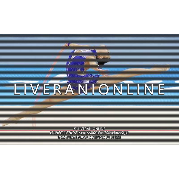 (101126) -- GUANGZHOU, Nov. 26, 2010 () -- Gold medalist Anna Alyabyeva of Kazakhstan performs during the individual all-around event of Rhythmic Gymnastics at the 16th Asian Games in Guangzhou, south China\'s Guangdong Province, Nov. 26, 2010. (/Wang Lei) - Xinhua/Photoshot - Ag. Aldo Liverani sas ITALY ONLY CINA - 16mi GIOCHI ASIATICI 2010: GINNASTICA RITMICA