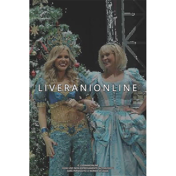 Pictured: Melinda Messenger and Joanna Page First Family Entertainment press launch photocall, PIccadilly Theatre, London, UK. 26/11/2010 Byline: Retna Pictures/Kiera Fyles /PHOTOSHOT/AG ALDO LIVERANI SAS - ITALY ONLY -